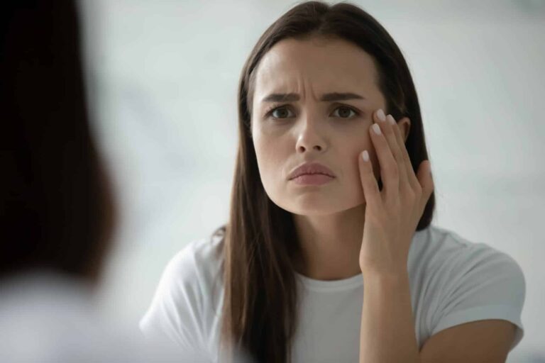 A woman in her 30s feels frustrated and dissatisfied with the changes in her skin as she ages.