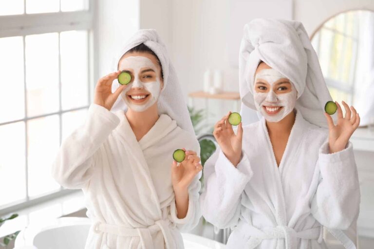 Young women care for their skin in the bathroom, highlighting how the pandemic changed the skincare industry when staying at home became the norm.
