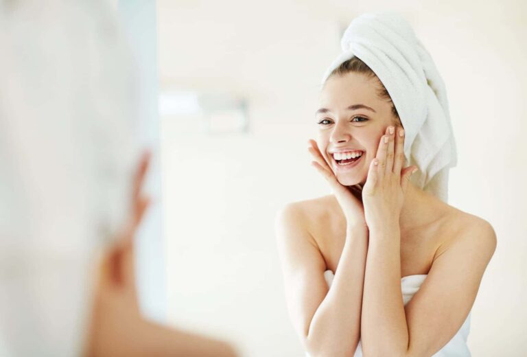 Healthy woman with perfect clear skin because she makes sure she gets zinc in her diet.