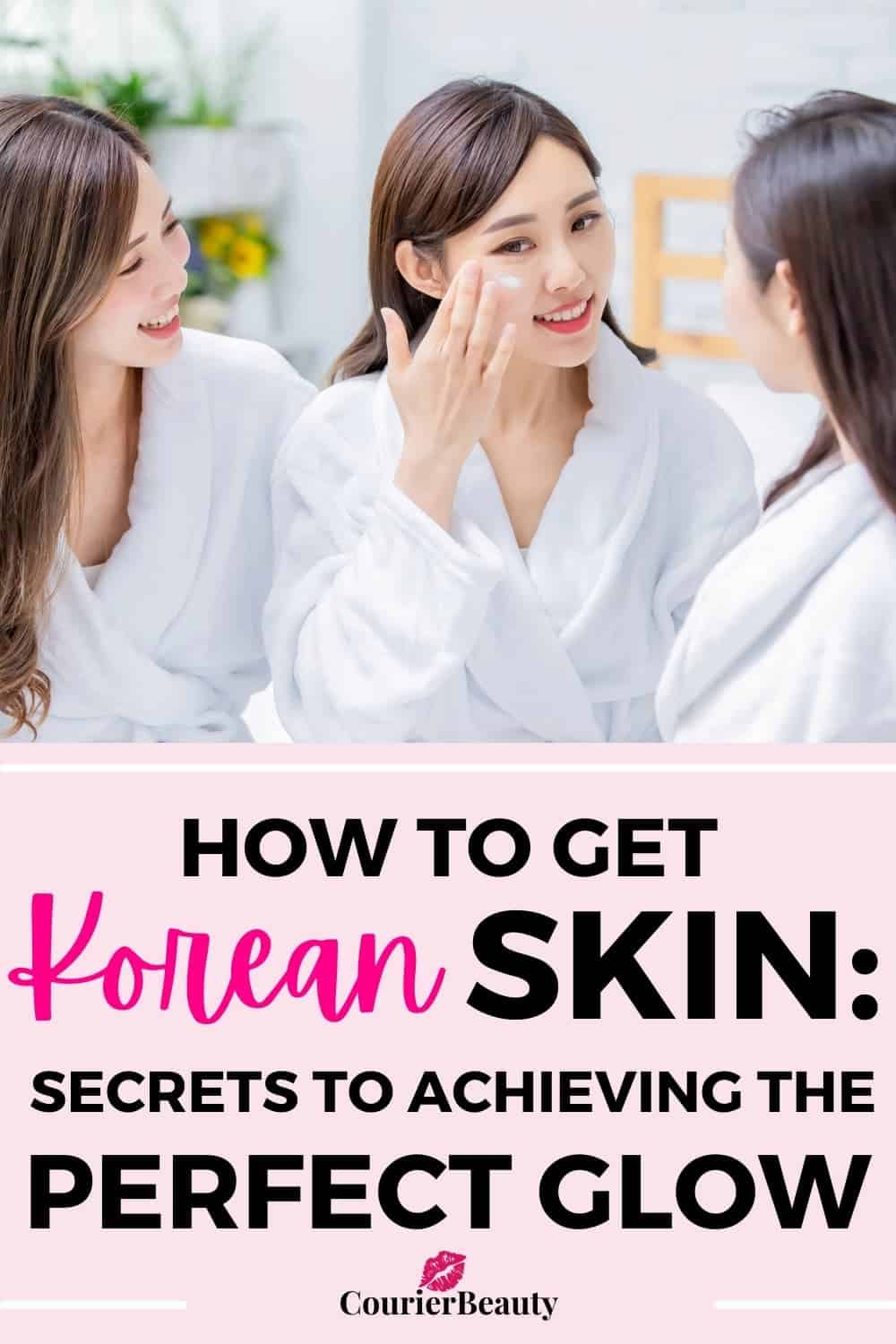 Three Asian women in white robes apply face cream and smile, showcasing a glowing Korean skin routine.