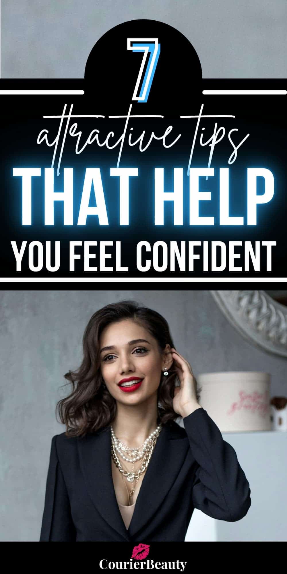 A stylish woman in a black blazer and pearls touches her hair, showcasing attractive tips through elegant styling and confidence.