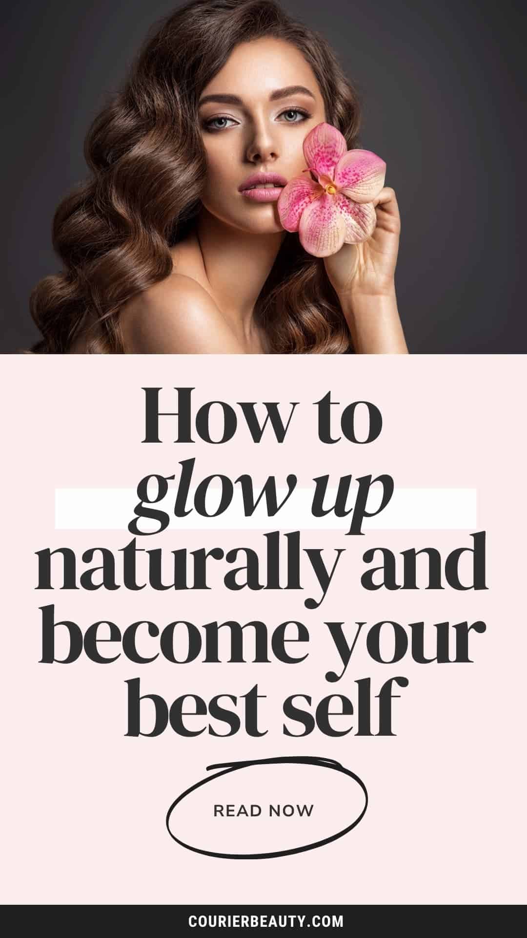 Portrait of a woman with long, wavy hair and makeup holding an orchid near her face.